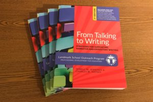 A stack of Landmark Outreach's publication of "From Talking to Writing."